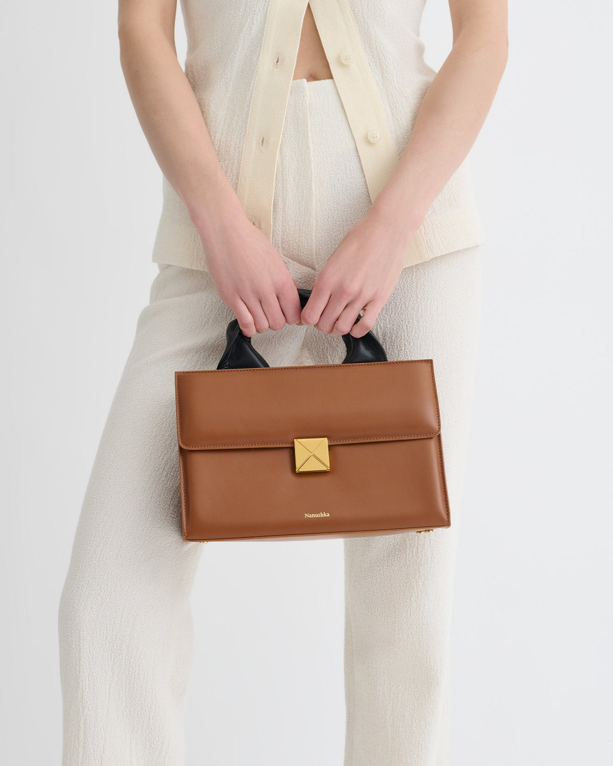 The SANDI Lock Top handle bag - Tan | Nanushka