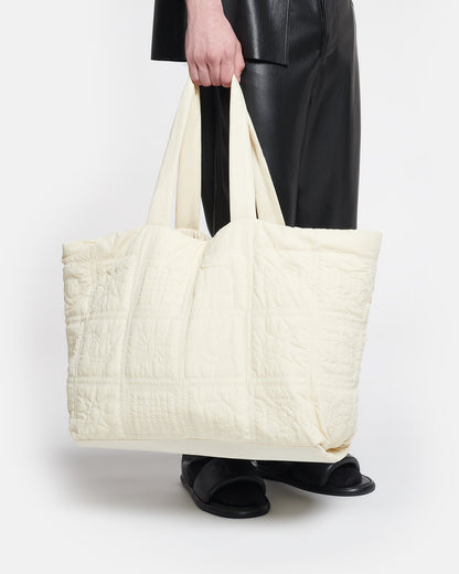 Symbol Quilted tote bag - Creme | Nanushka