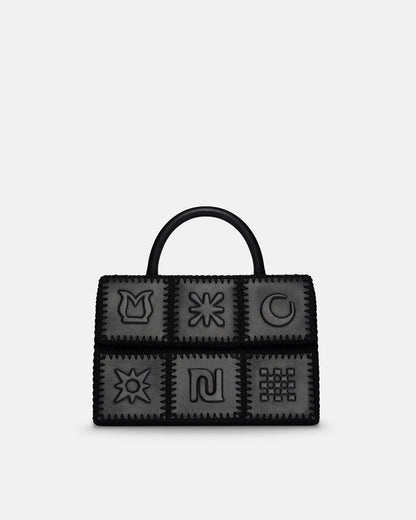 The SANDI Symbol Top handle bag - Black | Nanushka