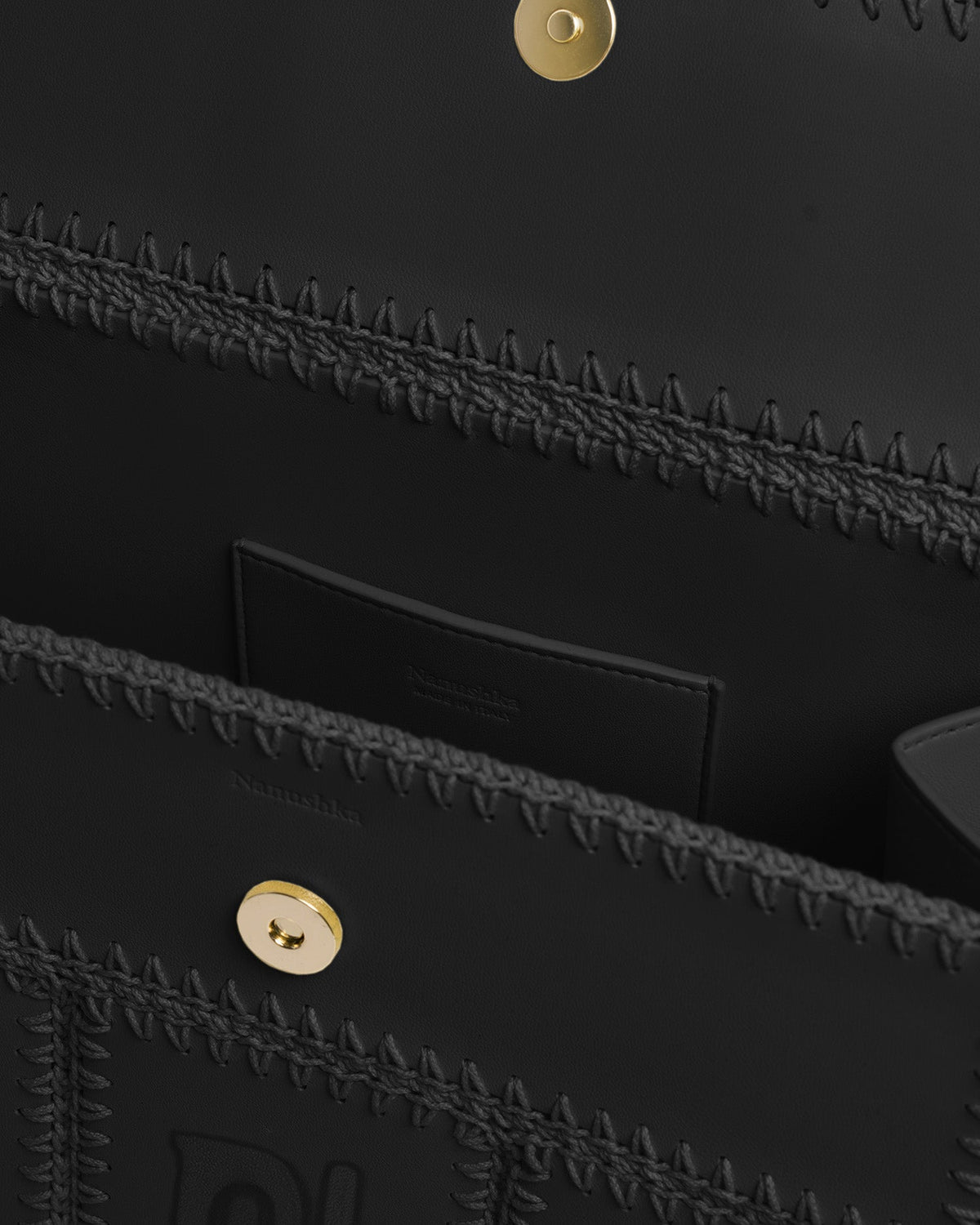 The SANDI Symbol Top handle bag - Black | Nanushka