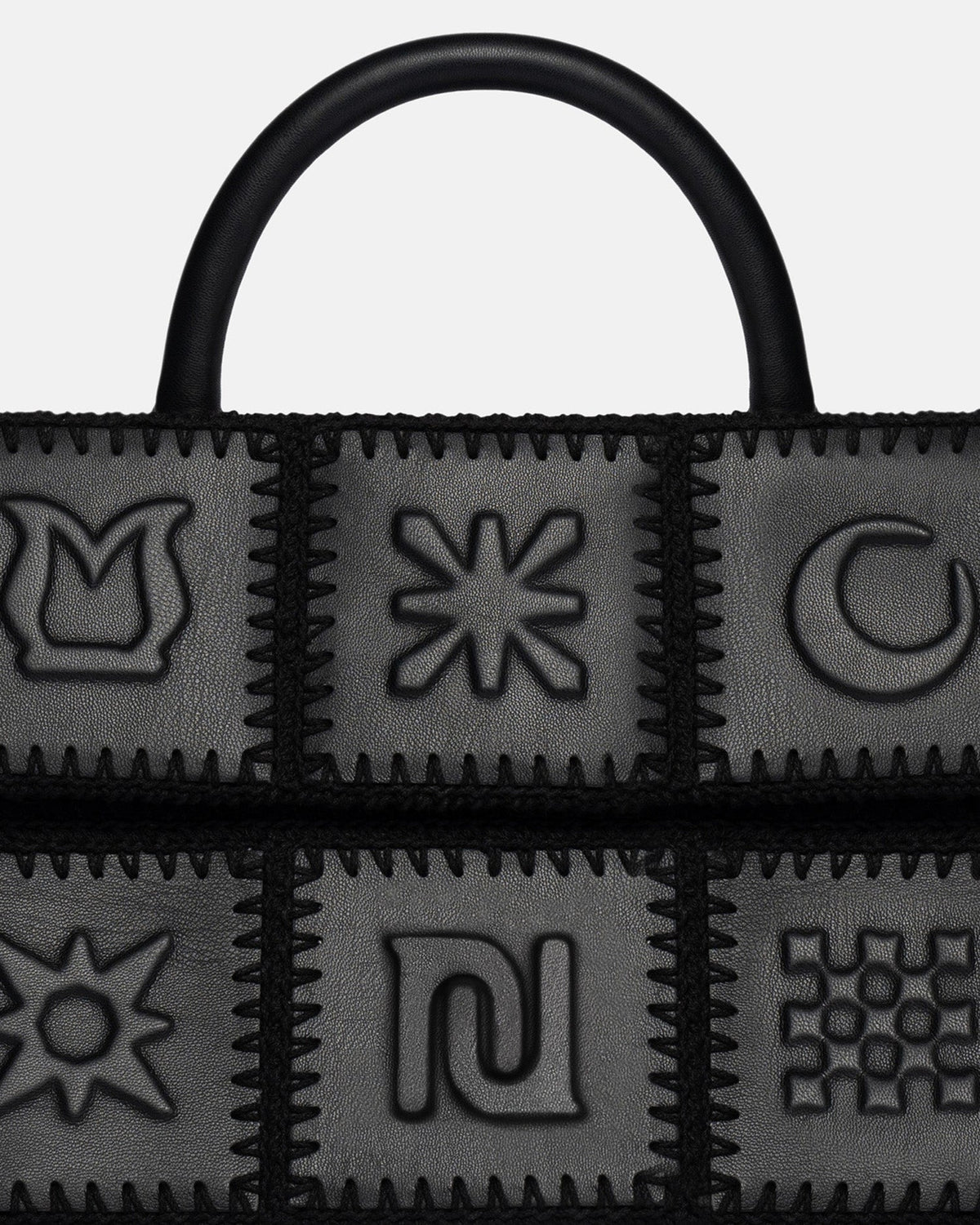 The SANDI Symbol Top handle bag - Black | Nanushka