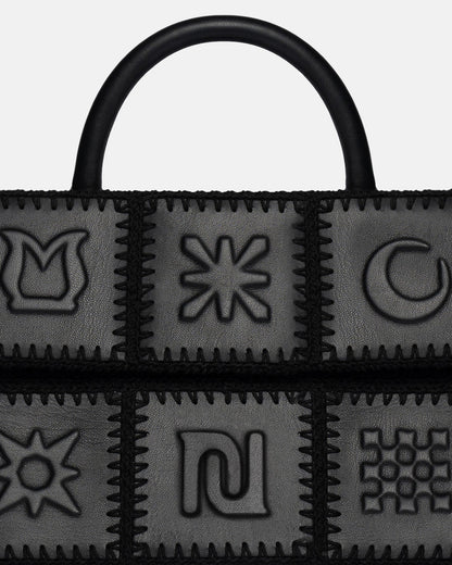 The SANDI Symbol Top handle bag - Black | Nanushka